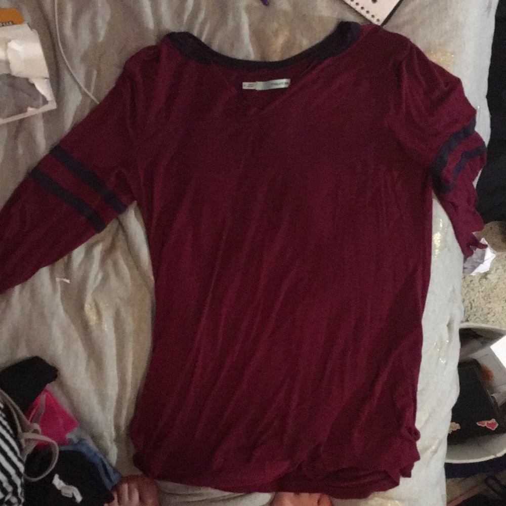 It’s is a maroon Maurices shirt